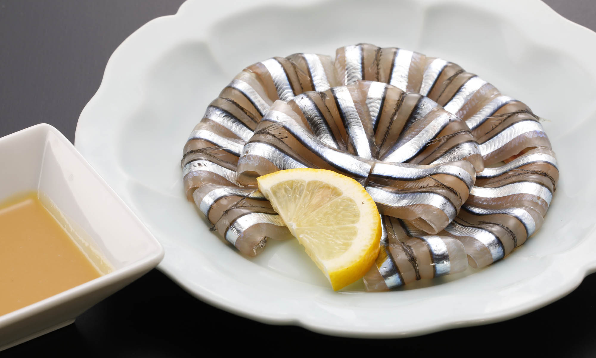 Silver-stripe round herring sashimi